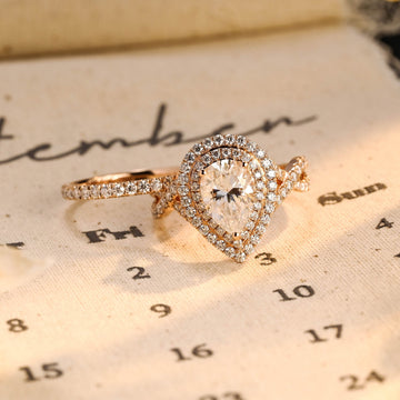 Cross/Twist Shank Pear Cut Double Halo Moissanite Engagement Ring Set