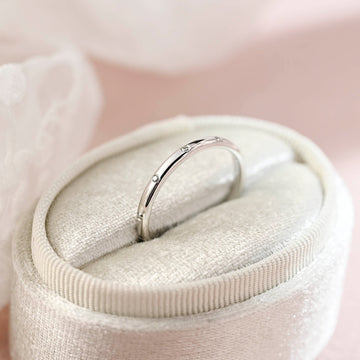 Solid Gold Round Flush Moissanite Wedding Band